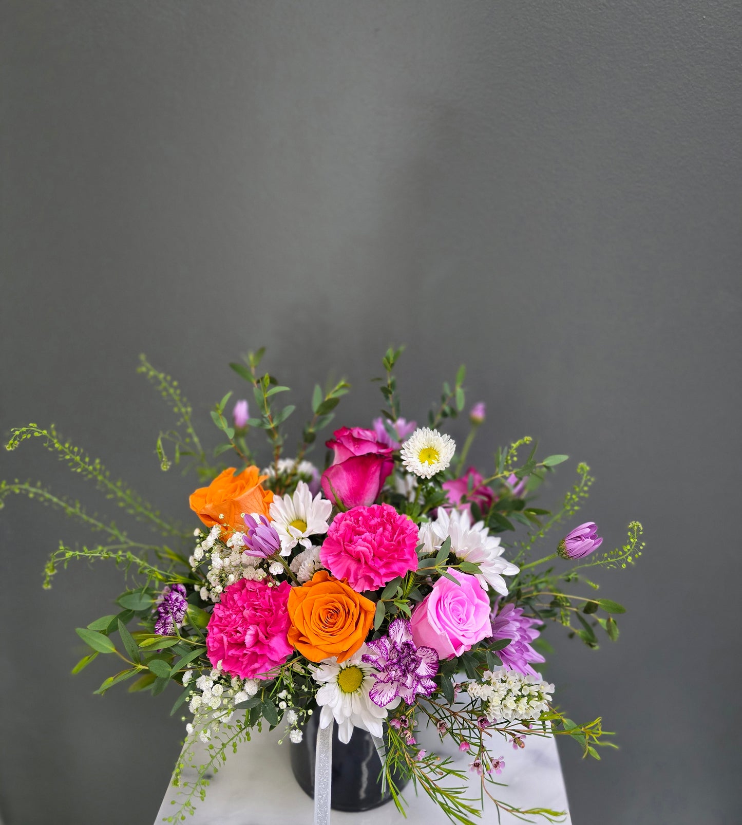 Cut Flowers With Black Small Vase