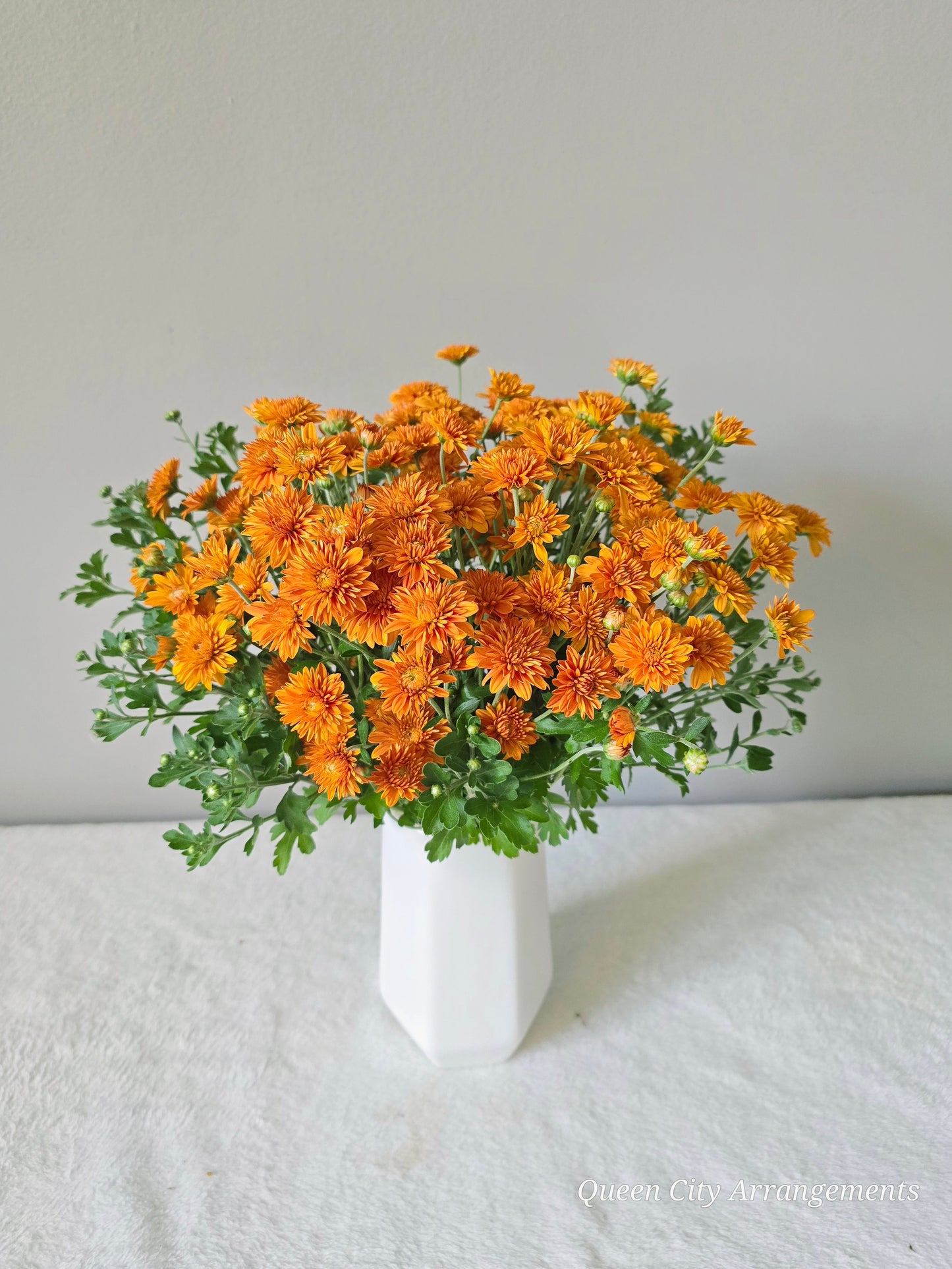 Orange Chrysanthemum Flower in Ceramic Vase