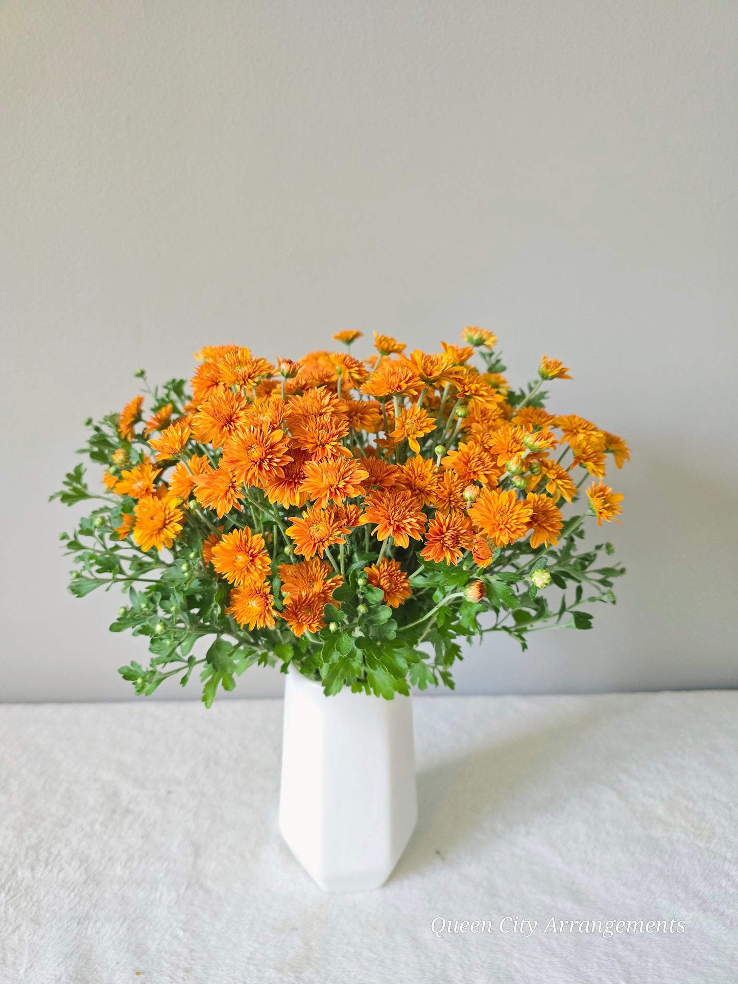 Orange Chrysanthemum Flower in Ceramic Vase