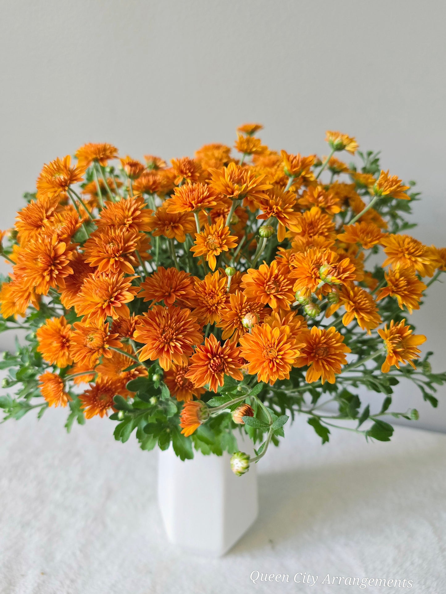 Orange Chrysanthemum Flower in Ceramic Vase