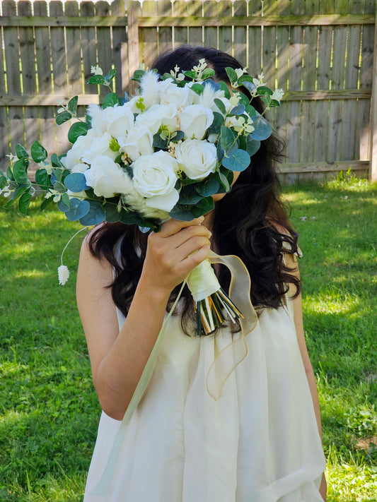 Boutonnieres $ White Rose Bouquet