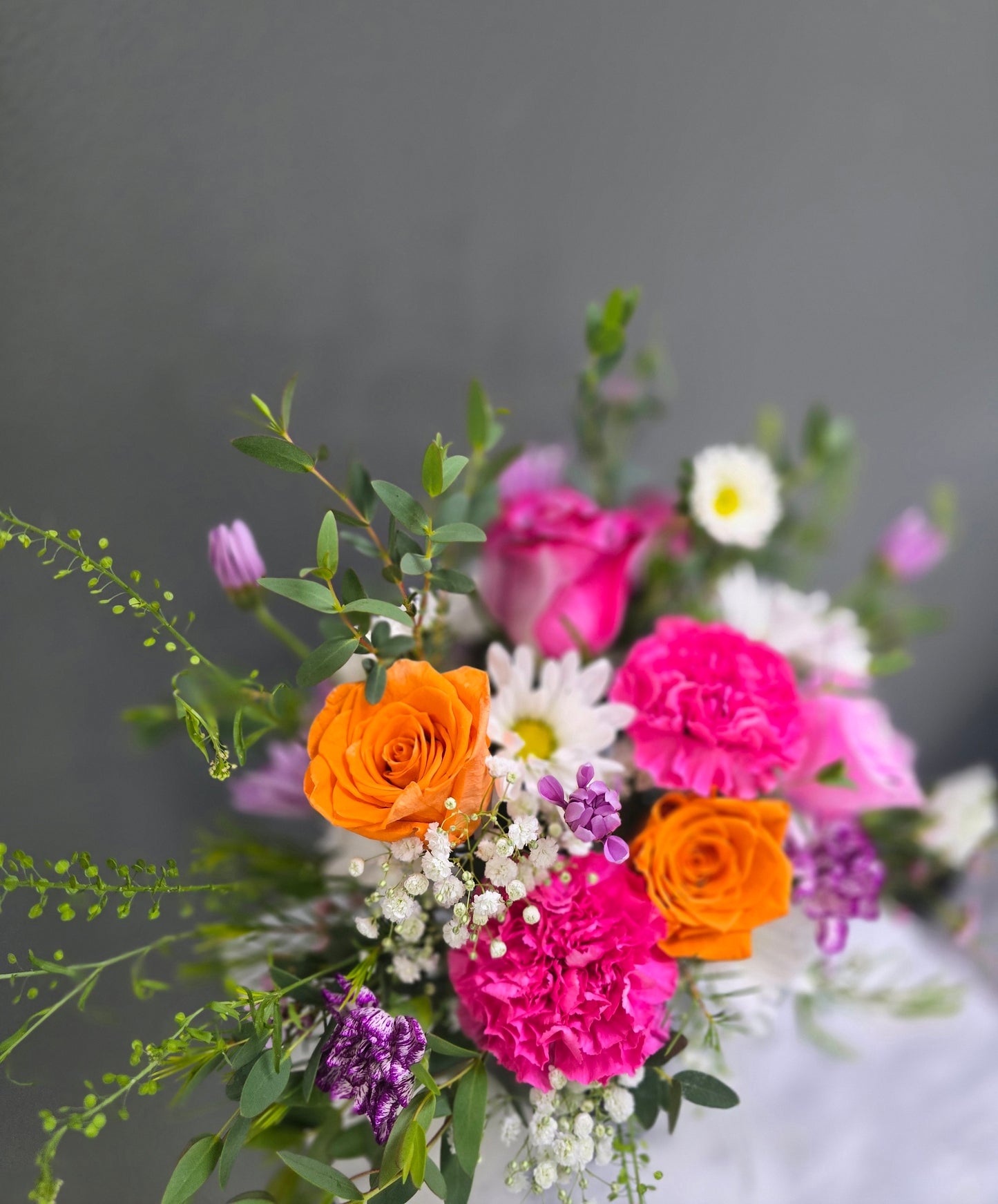 Cut Flowers With Black Small Vase