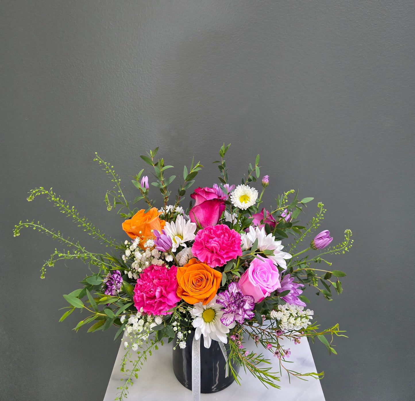 Cut Flowers With Black Small Vase