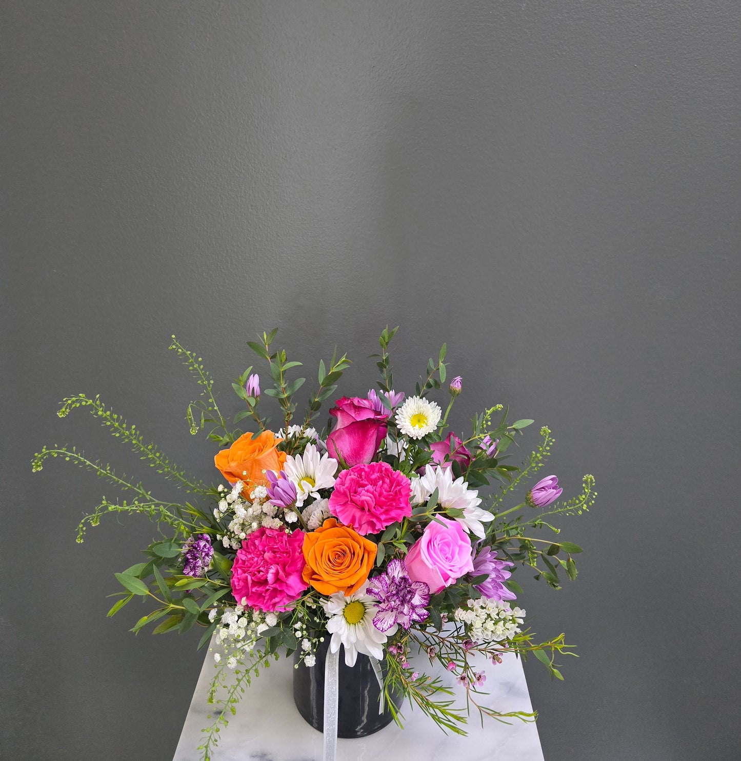 Cut Flowers With Black Small Vase
